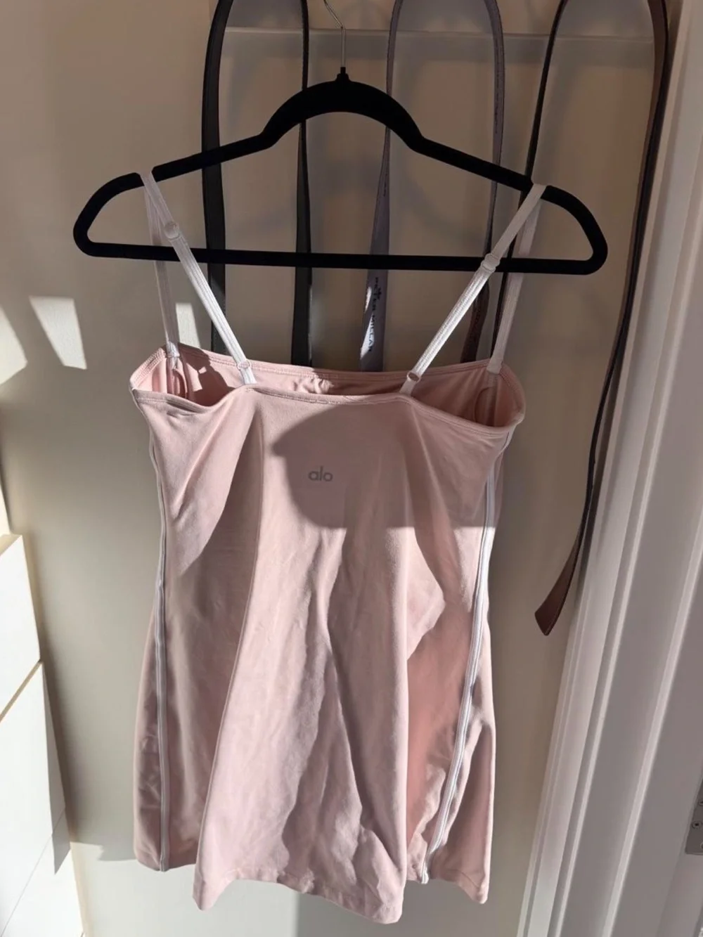 Alo Yoga Airbrush Streamlined Mini Dress in Pink Quartz/White.